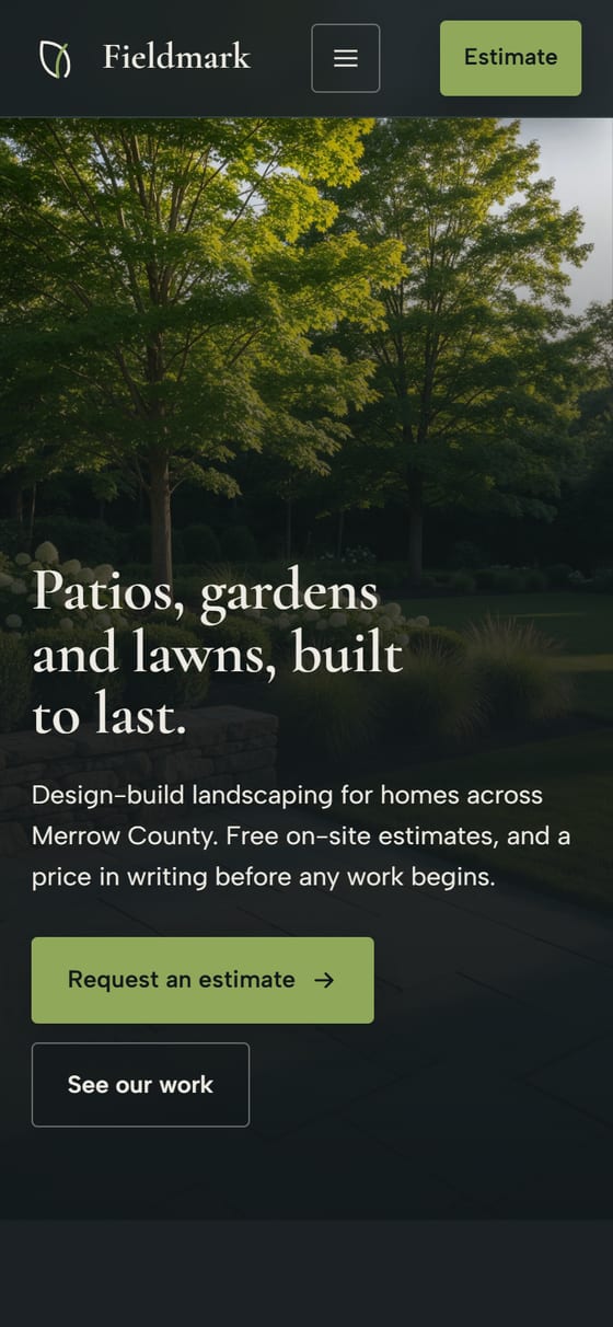 Screenshot of the same sample landscaping website on a phone screen.